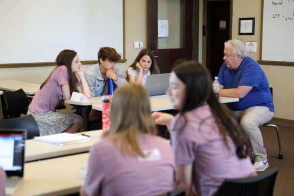 Dr. Geenens teaching a business leadership class